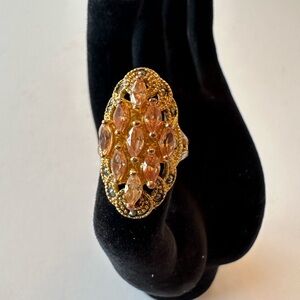 Gold tone Cocktail Ring with Gold and Green “Gems”